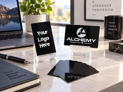 Custom black aluminum business card with laser-engraved company details